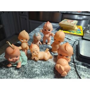 7 Vintage Rubber Kewpie Dolls Taiwan Standing Laying Sitting